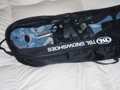 The TSL snowshoes in their carry bag.